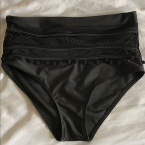 Black two piece bathing suit with high rise bottom